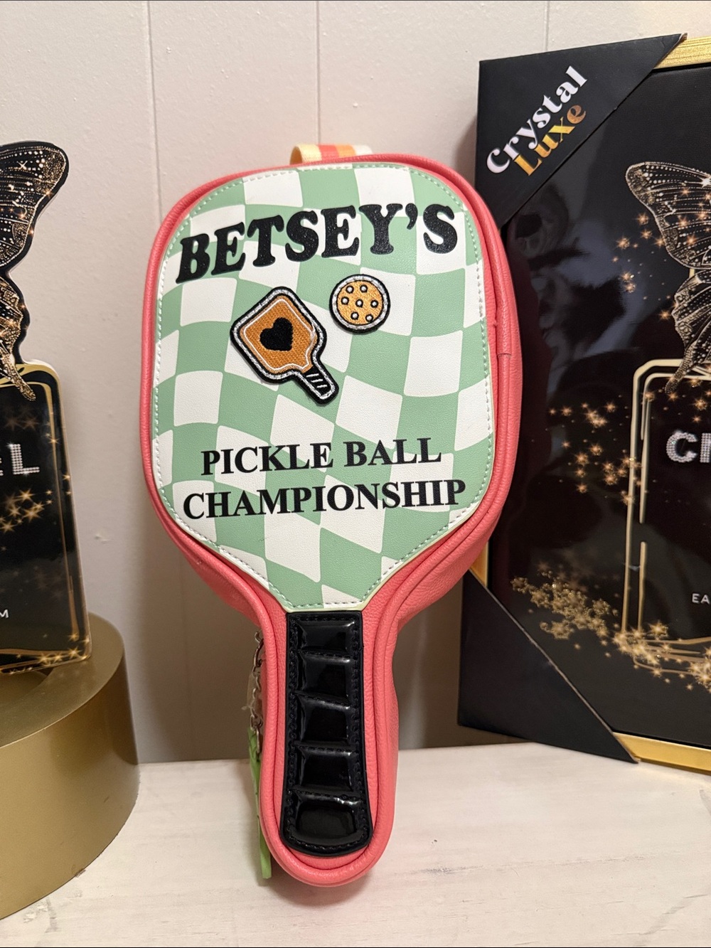 Betsey Johnson Coral and Mint Argyle Paddle Case with Lime Pickle Charm